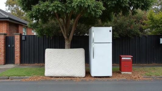 A mattress and fridge correctly placed on a nature strip for a booked council collection